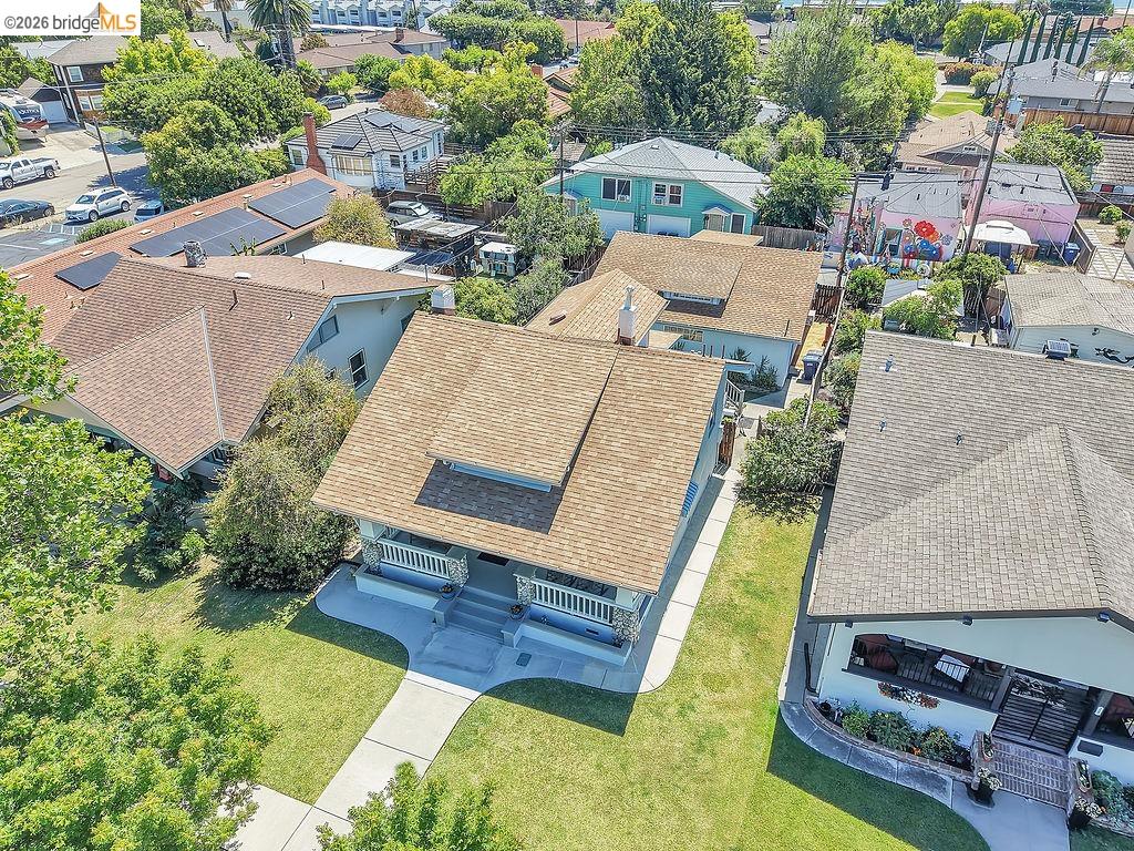 325 South 2nd Street Rio Vista, CA 94571 - Photo 3 of 33 Craftsman-style residence featuring a prominent gabled roof with dormer, a covered front porch with white railings, and a stone facade foundation