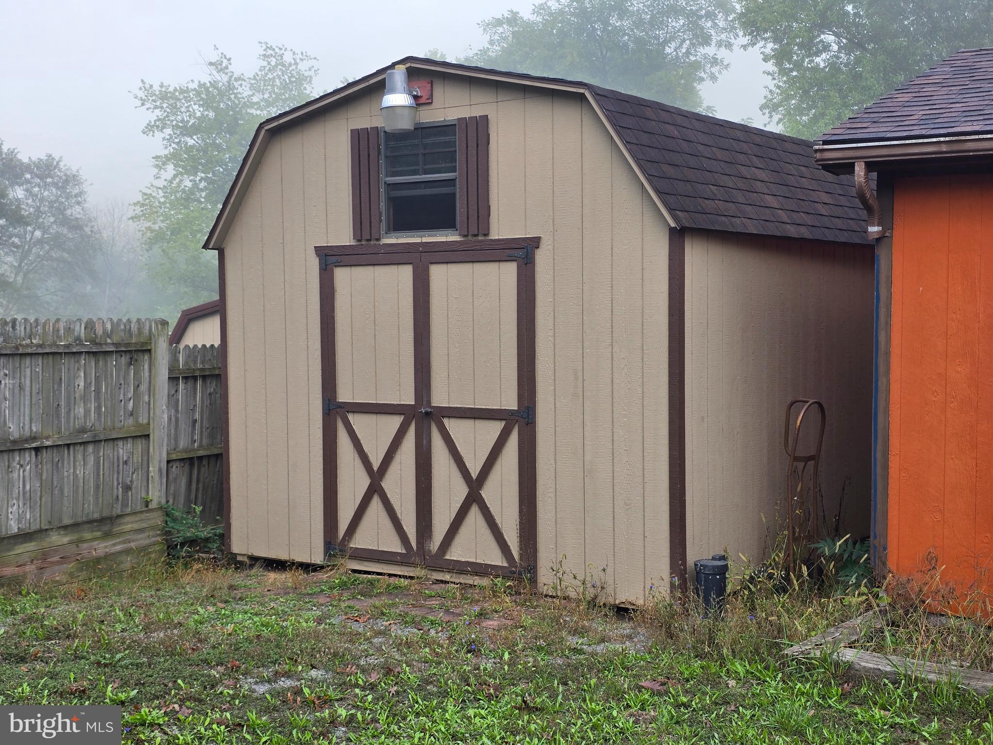 3165 Springfield Pike Springfield, WV 26763 - Photo 16 of 16 a view of backyard of house with wooden fence