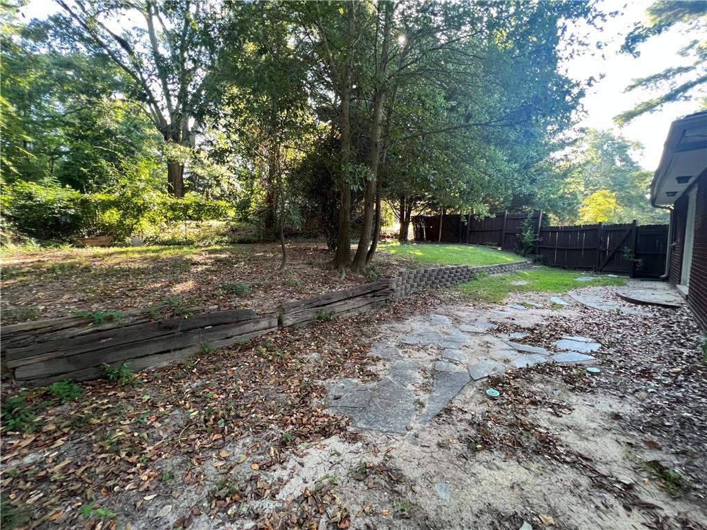 434 Christopher Drive Gainesville, GA 30501 - Photo 11 of 11 a view of a yard with plants and trees