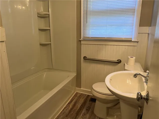 a bathroom with a sink and a toilet