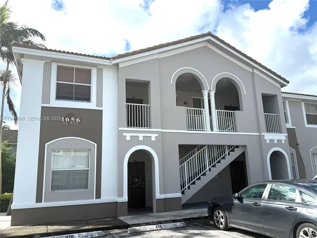 a front view of a house with windows