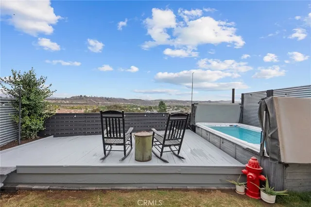 a view of a terrace with furniture