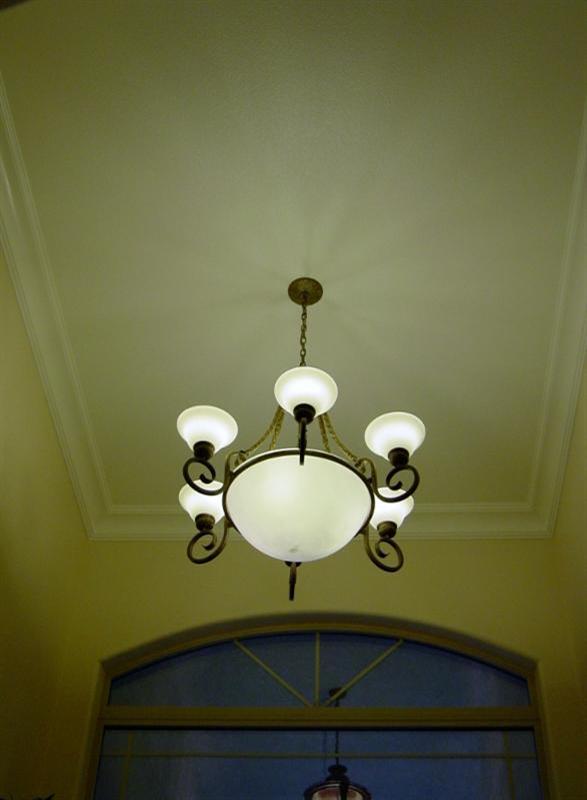 2416 Rodeo Street Selma, CA 93662 - Photo 39 of 99 Gorgeous lighting, cathedral ceilings with crown molding in entry