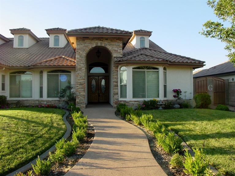 2416 Rodeo Street Selma, CA 93662 - Photo 56 of 99 Front view with stone accents and bay windows