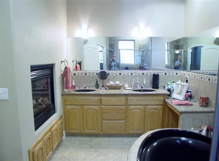 2416 Rodeo Street Selma, CA 93662 - Photo 65 of 99 2 sided fireplace shared with master bedroom