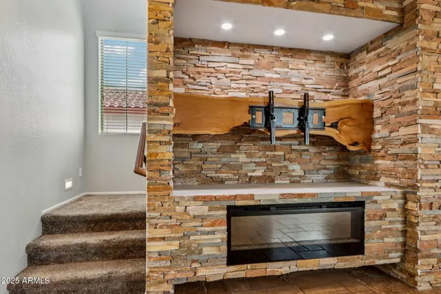 a kitchen with stainless steel appliances granite countertop a sink stove and a refrigerator