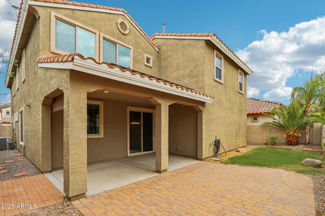 a view of a terrace with a garden and mountain view