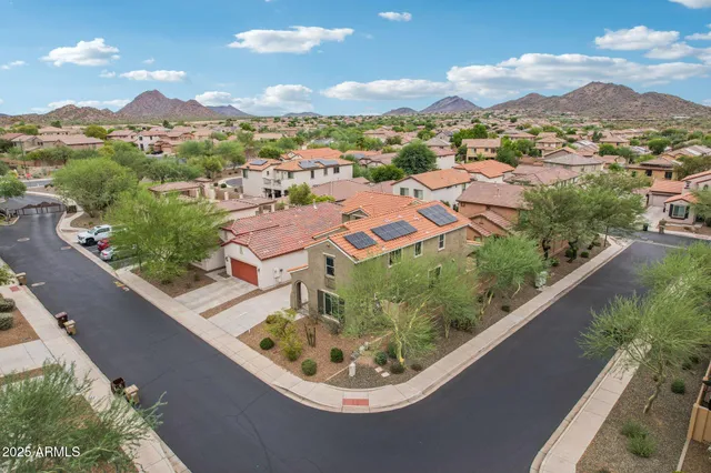 an aerial view of residential building with outdoor space