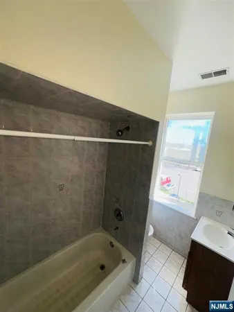 a bathroom with a bathtub