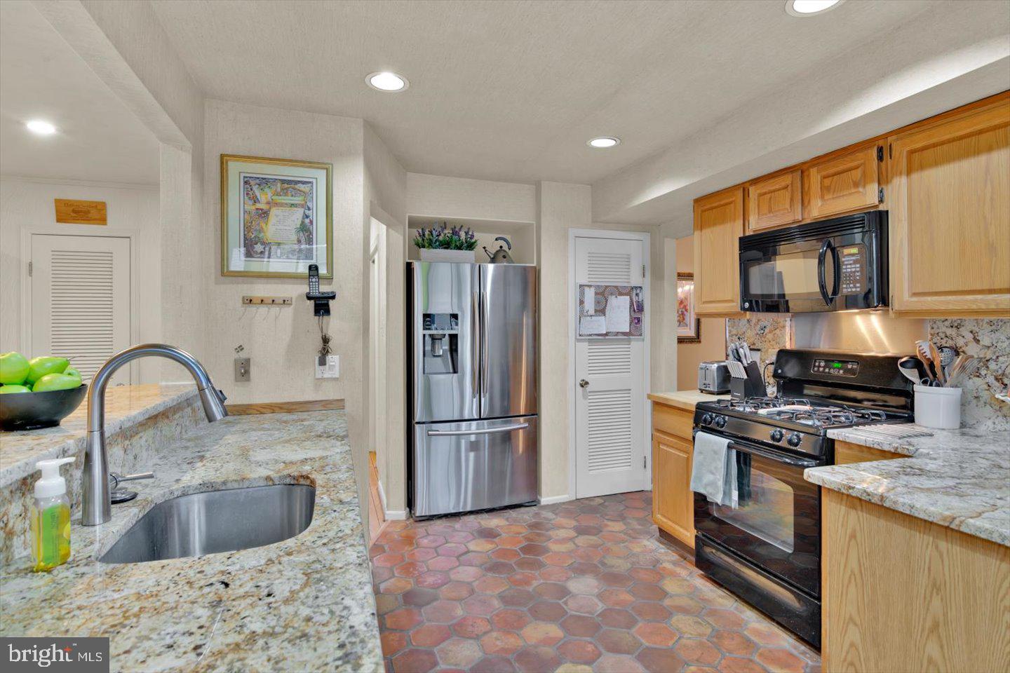 123 Hart Road Cherry Hill, NJ 08034 - Photo 21 of 57 a kitchen with stainless steel appliances granite countertop a refrigerator sink and stove