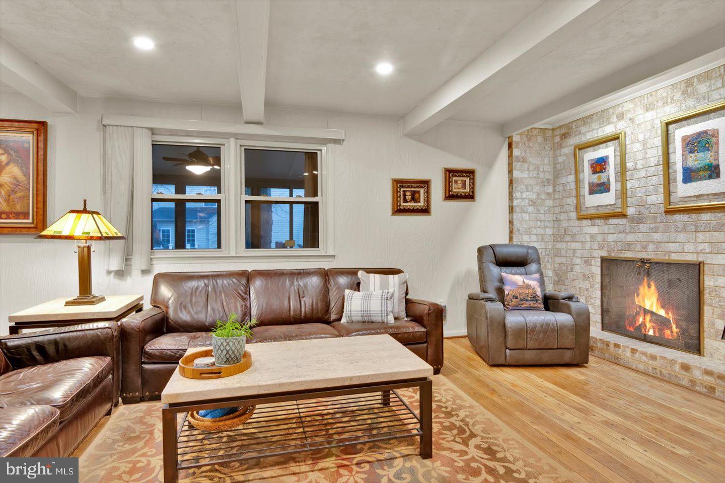 123 Hart Road Cherry Hill, NJ 08034 - Photo 29 of 57 a living room with furniture and a fireplace