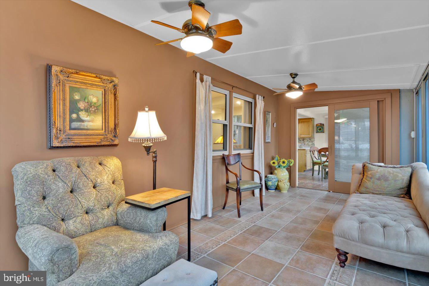 123 Hart Road Cherry Hill, NJ 08034 - Photo 31 of 57 a living room with furniture and a chandelier