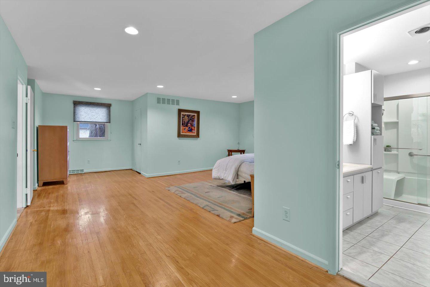 123 Hart Road Cherry Hill, NJ 08034 - Photo 39 of 57 a bedroom with a bed and wooden floor