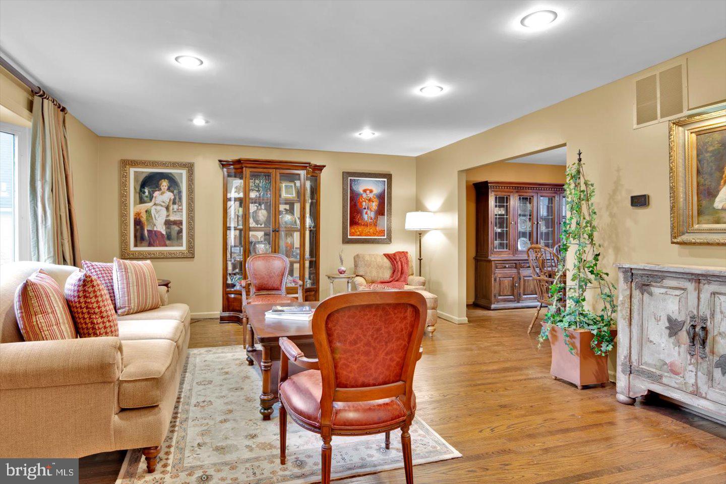 123 Hart Road Cherry Hill, NJ 08034 - Photo 10 of 57 a living room with furniture and a flat screen tv