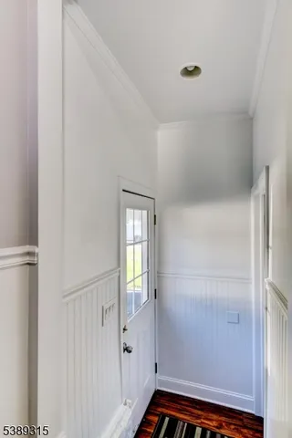 a bed room with a bed and a chair