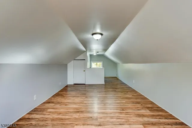 a view of a garage with parked cars