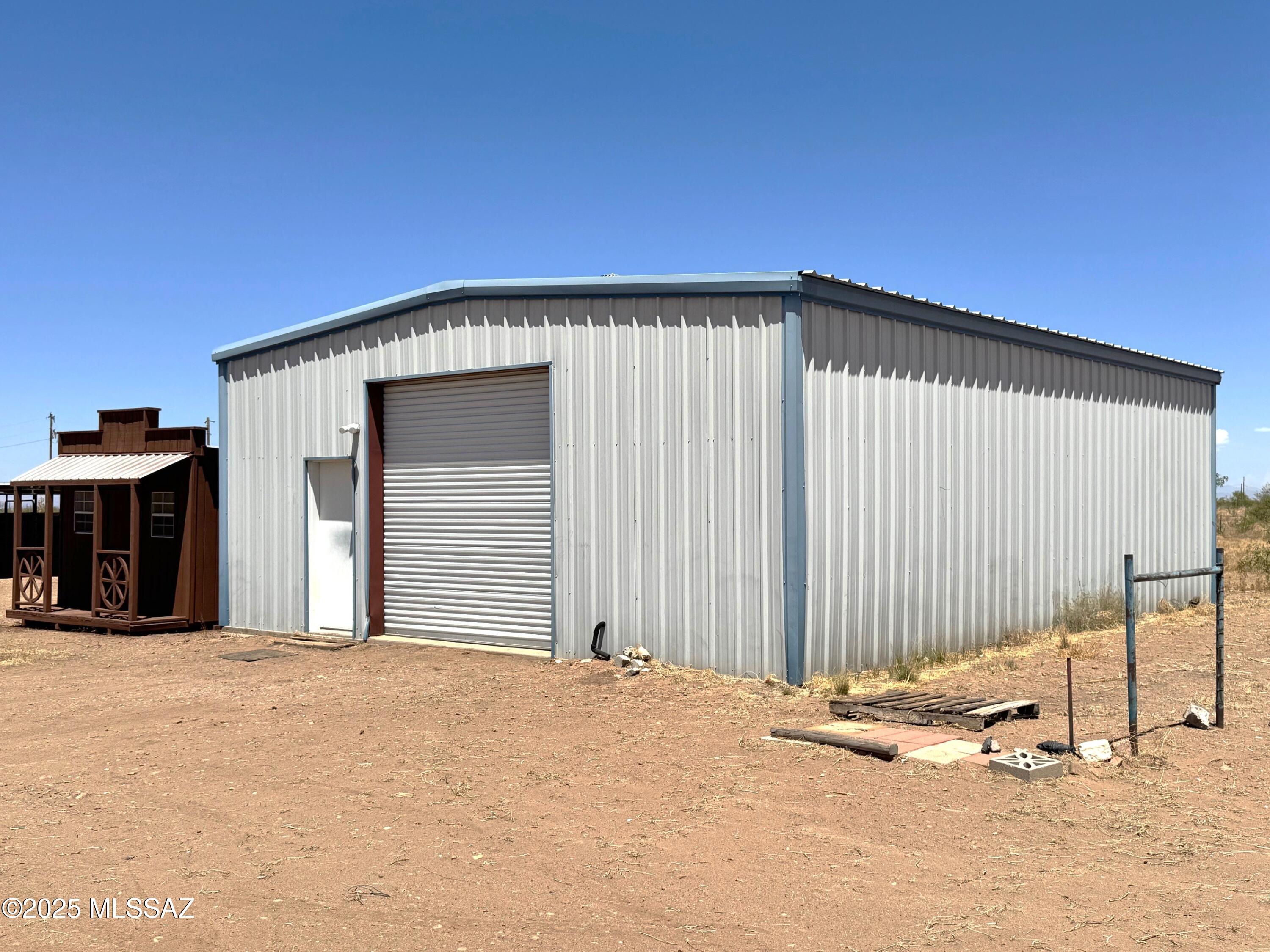 13384 South Cottonwood Road Pearce, AZ 85625 - Photo 30 of 46 a view of a house with a outdoor space