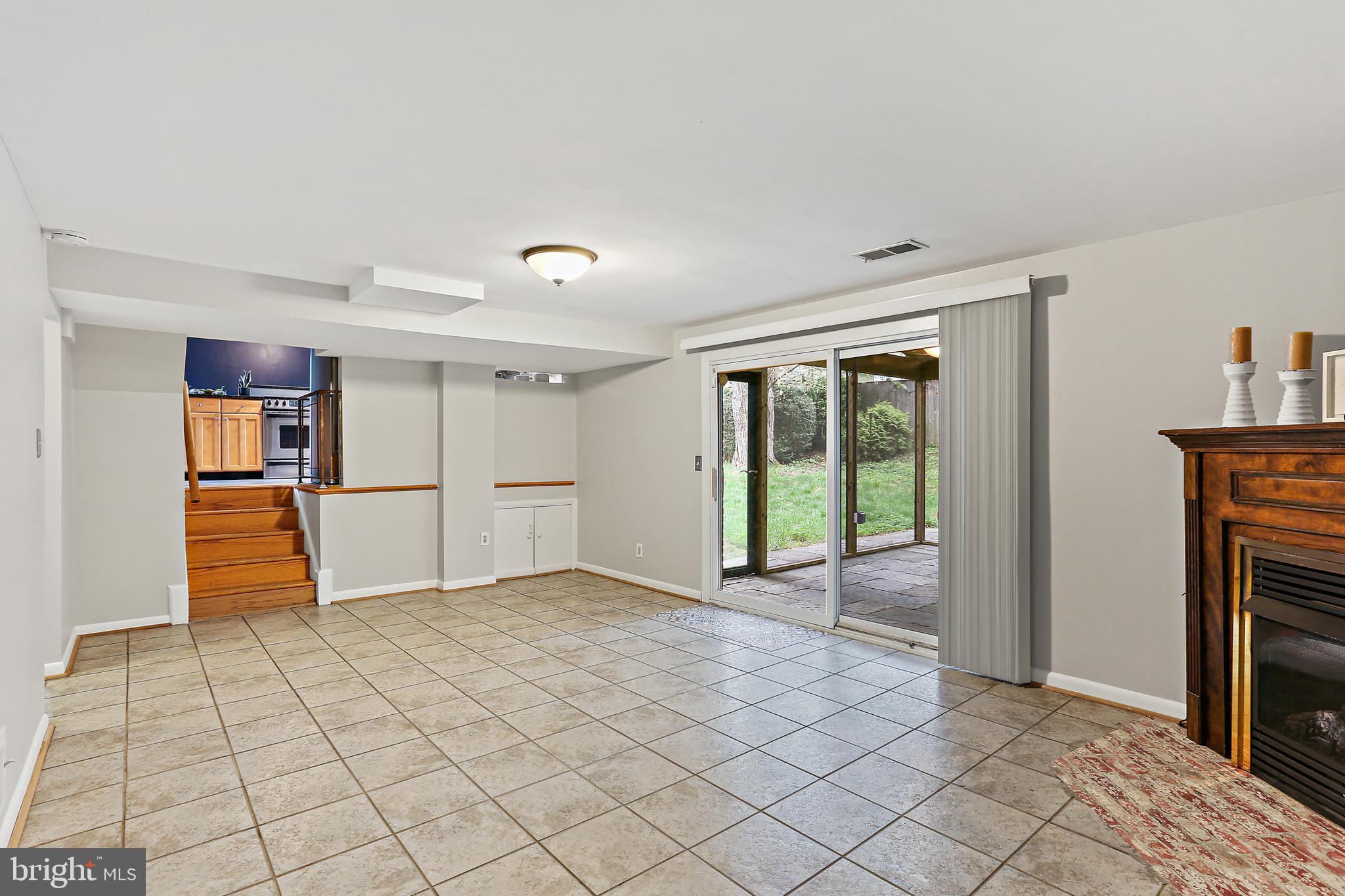 403 Eisner Street Silver Spring, MD 20901 - Photo 29 of 36 Lower Level Leading to Screened-in Porch