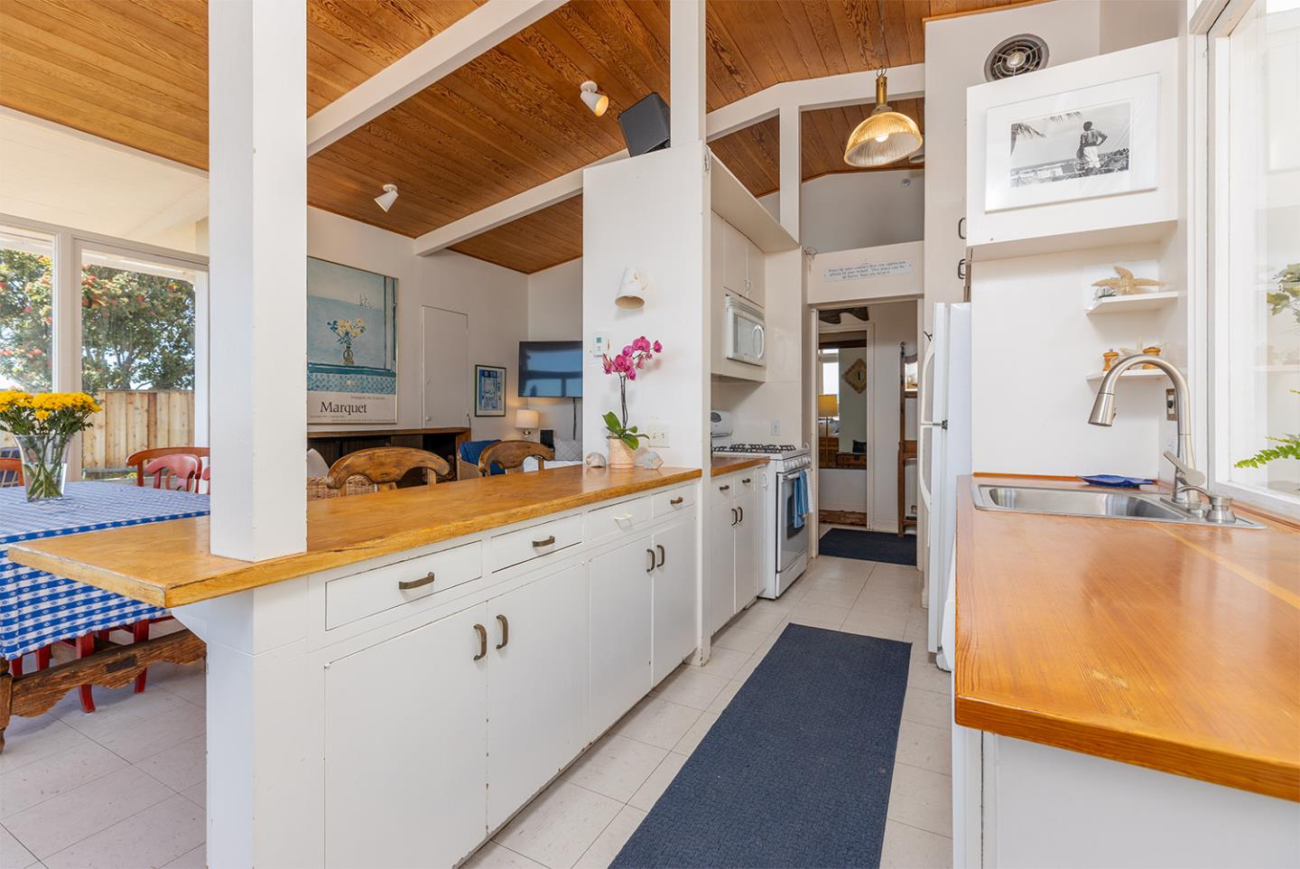 739 Las Olas Drive Aptos, CA 95003 - Photo 15 of 31 a large white kitchen with a large window
