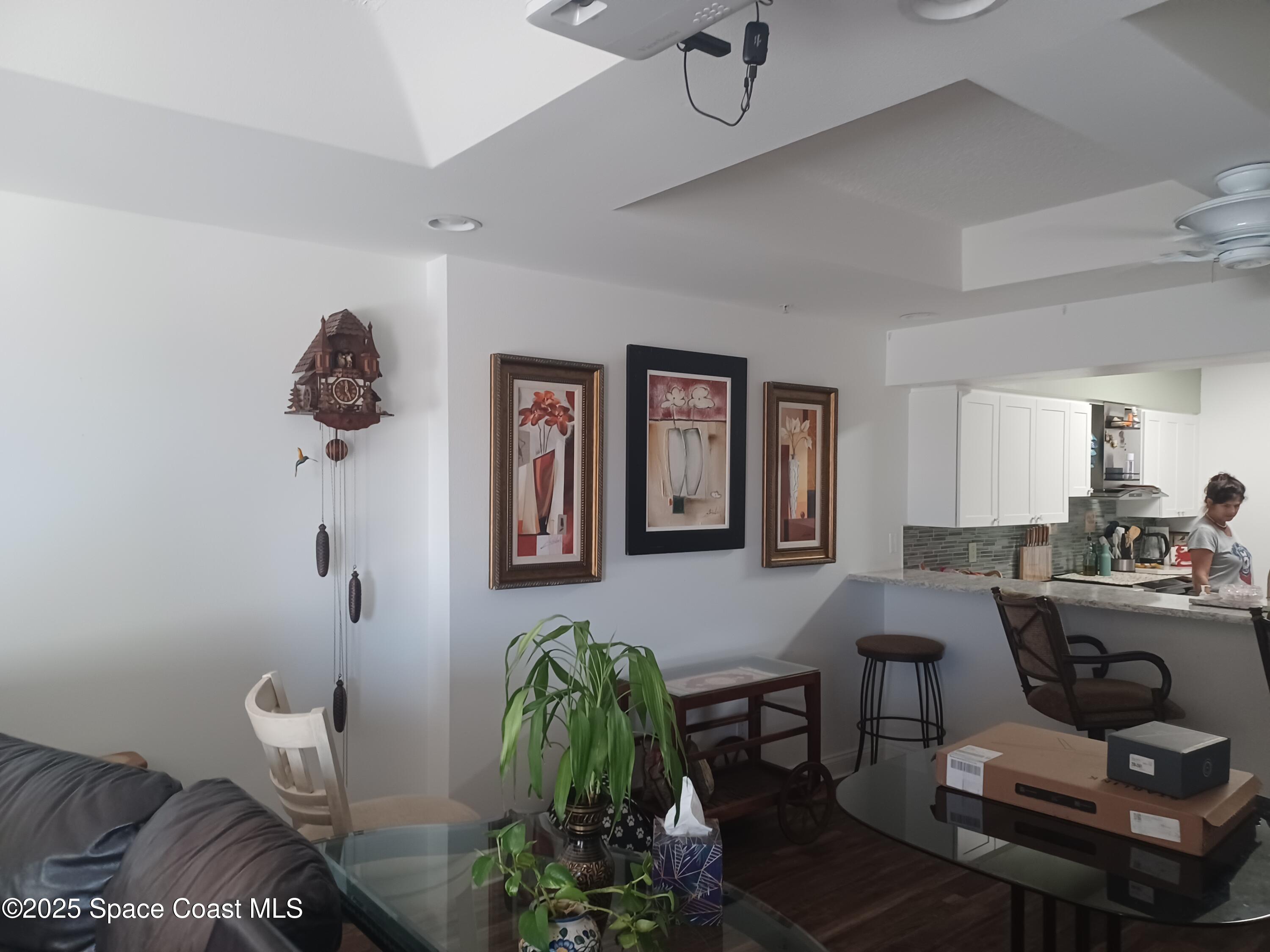 105 Pulsipher Avenue, Unit 403 Cocoa Beach, FL 32931 - Photo 13 of 15 a workspace with furniture and window