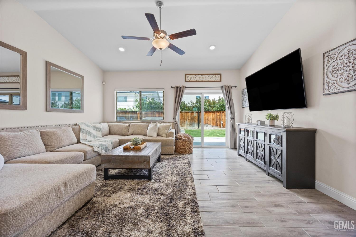 Undisclosed Address Shafter, CA 93263 - Photo 19 of 43 a living room with furniture and a flat screen tv