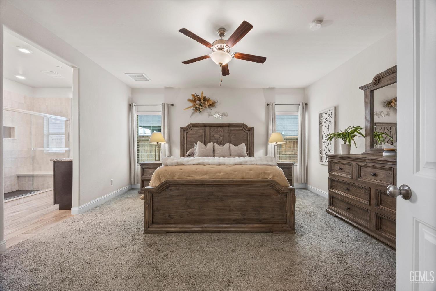 Undisclosed Address Shafter, CA 93263 - Photo 22 of 43 a bedroom with a bed and ceiling fan