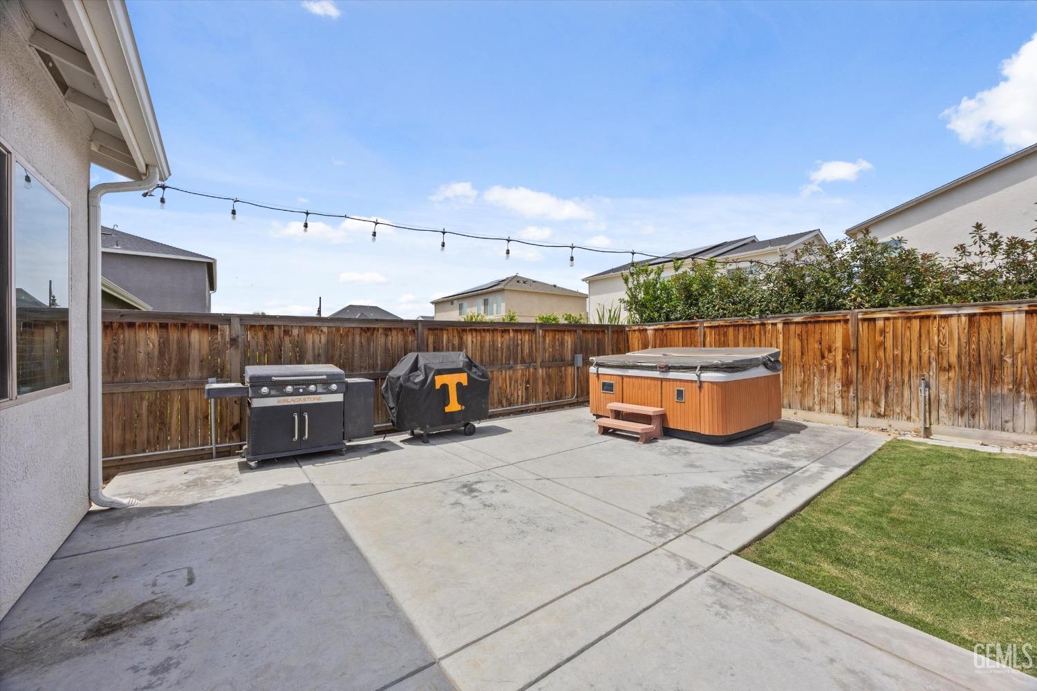 Undisclosed Address Shafter, CA 93263 - Photo 33 of 43 a view of a living room with furniture and a garden