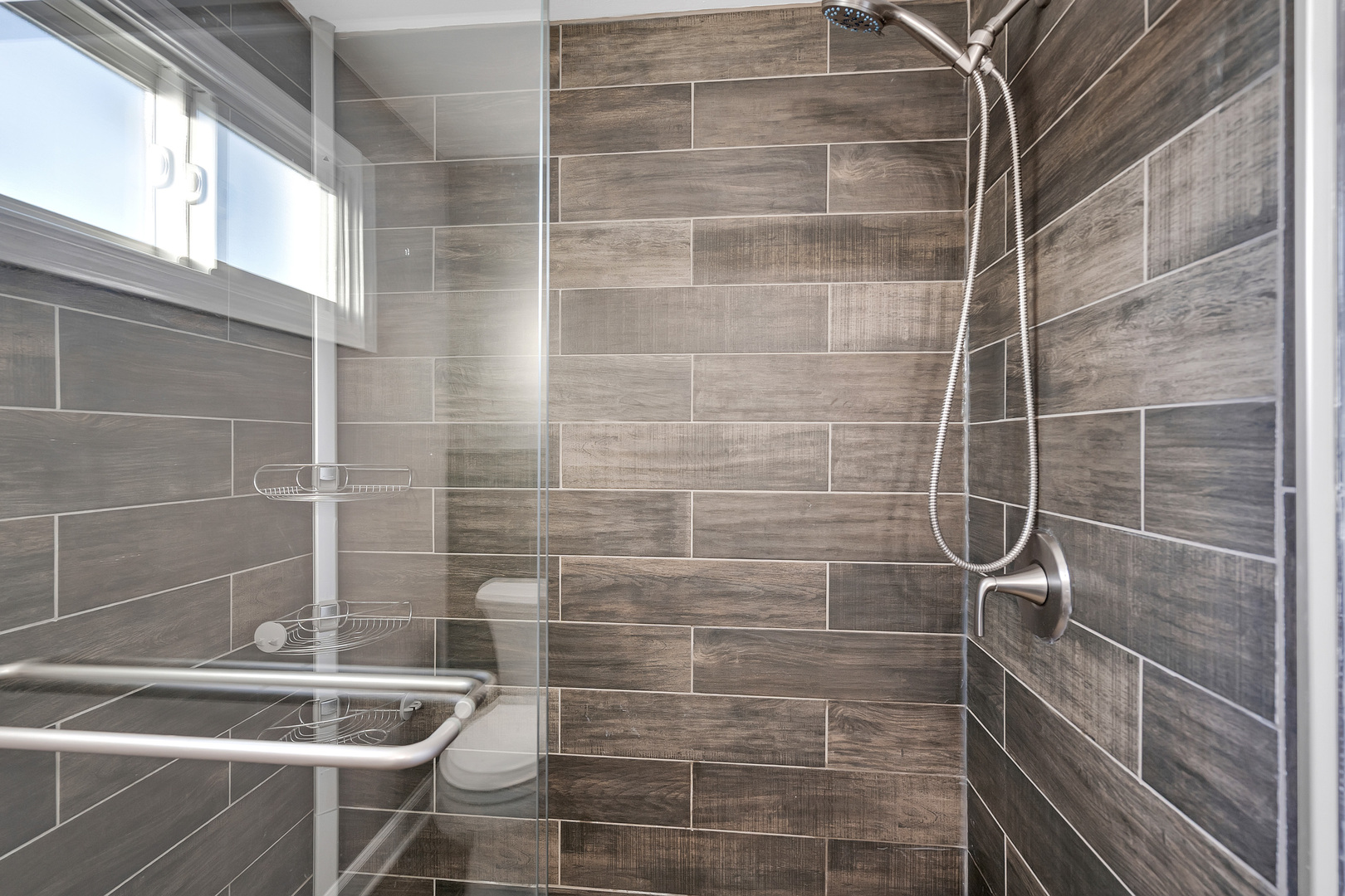 3225 Illinois Road Wilmette, IL 60091 - Photo 17 of 22 a bathroom with a shower