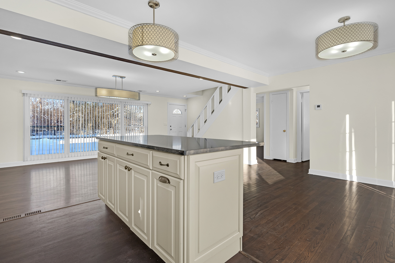 3225 Illinois Road Wilmette, IL 60091 - Photo 6 of 22 a kitchen with cabinets and window