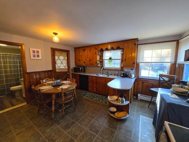 a living room with lots of furniture and a flat screen tv
