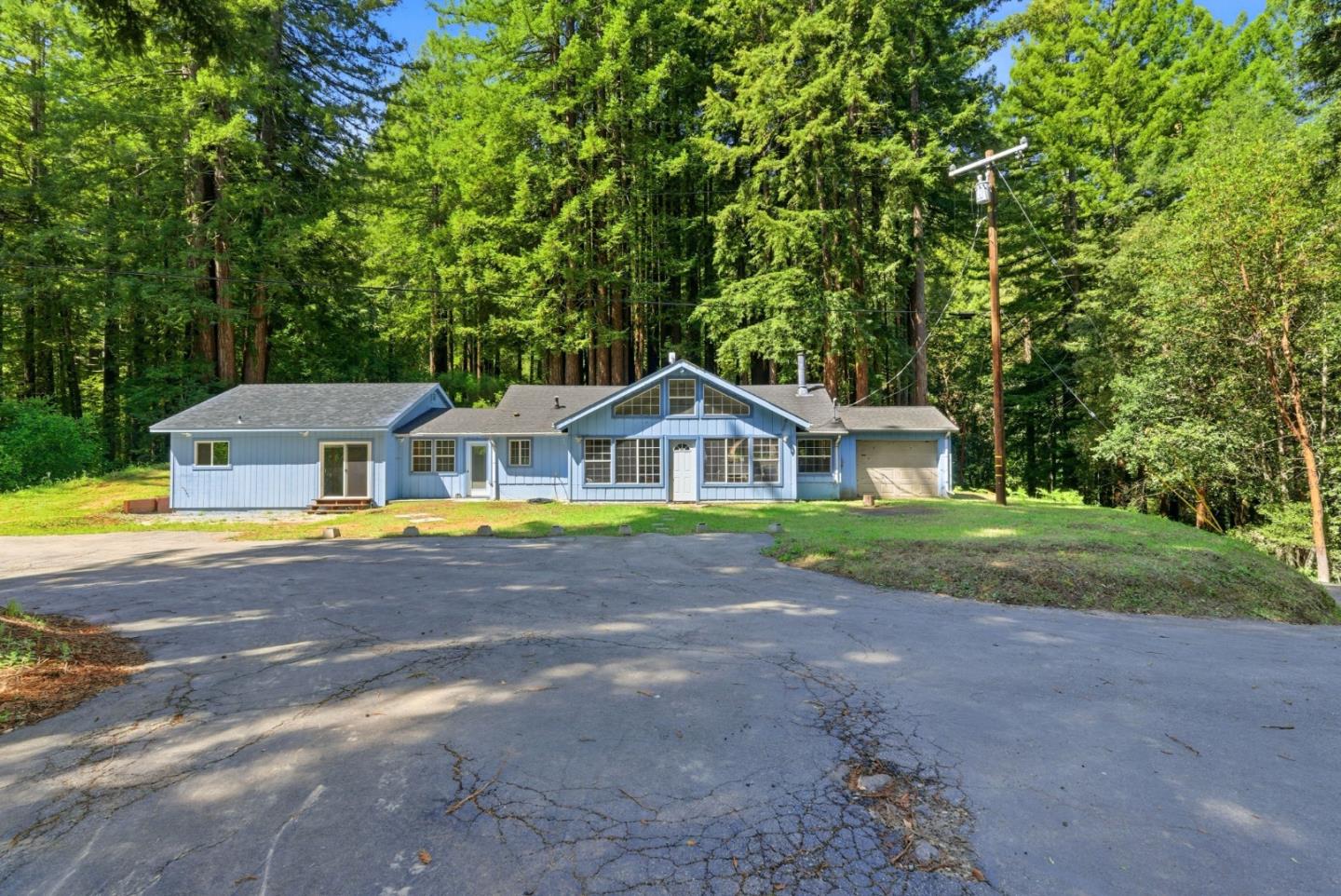 1460 Tucker Road Scotts Valley, CA 95066 - Photo 1 of 32 a aerial view of a house with a yard