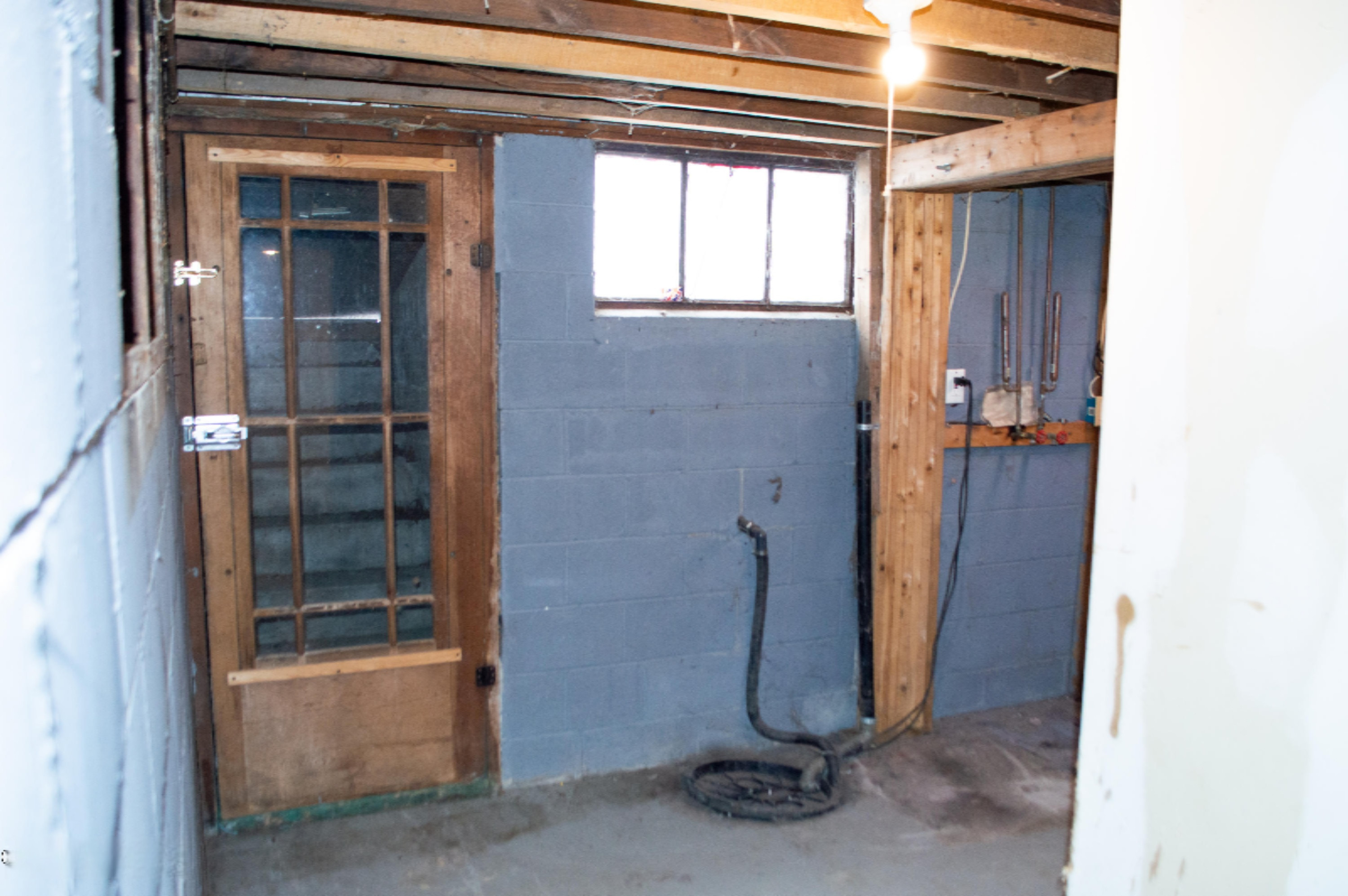 265 West River Road Muskegon, MI 49445 - Photo 23 of 32 Basement Exterior Access