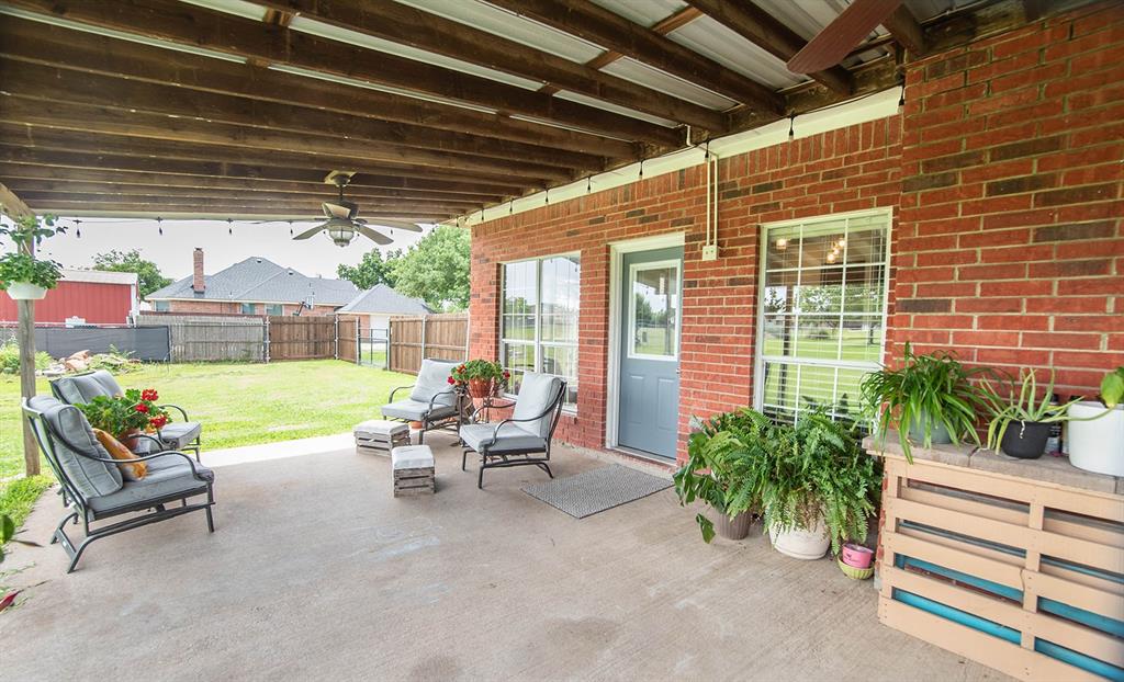 10336 Jennifer Circle Forney, TX 75126 - Photo 29 of 37 This is a HUGE coverd patio! Perfect for entertaining or just relaxing with family! Very spacious and a great "second living area" for this country home.