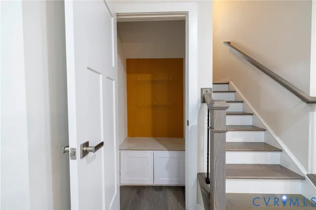 a view of a room with table tennis table and windows