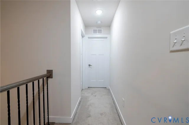 a view of a living room with a bathroom