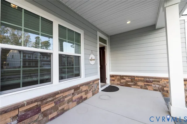 a view of a house with a large window