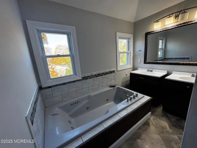 a bathroom with a sink and a tub
