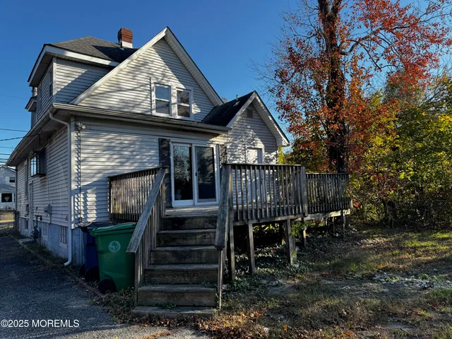 a view of road with trees in the background