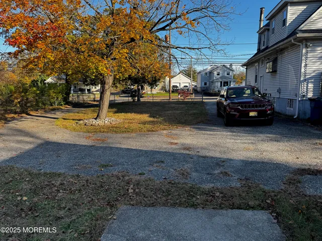 a view of swimming pool with a yard