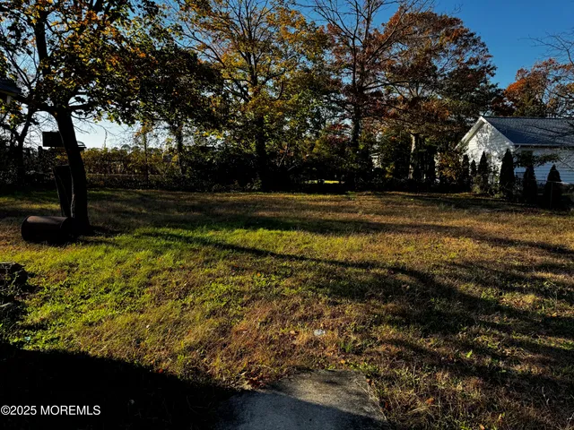 a view of a wooden deck with a bench