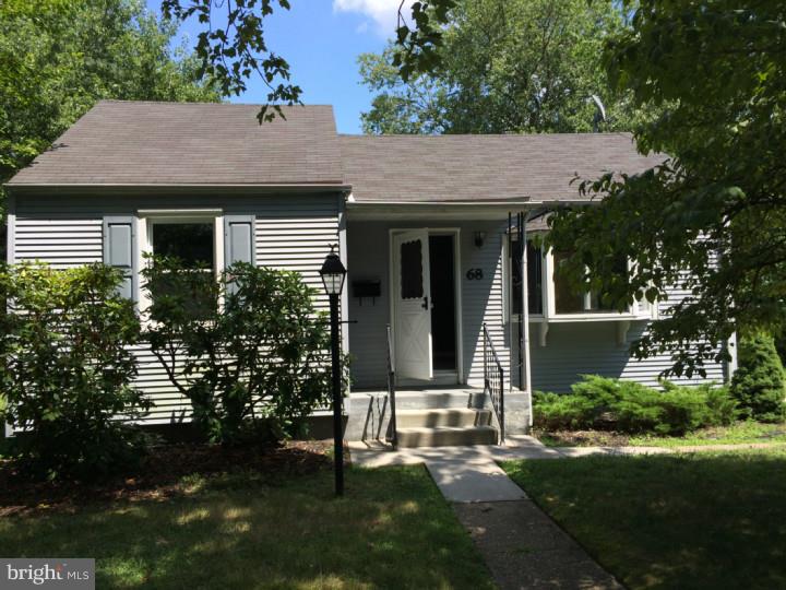 68 Stanford Road Cherry Hill, NJ 08034 - Photo 1 of 4 front view of a house with a yard