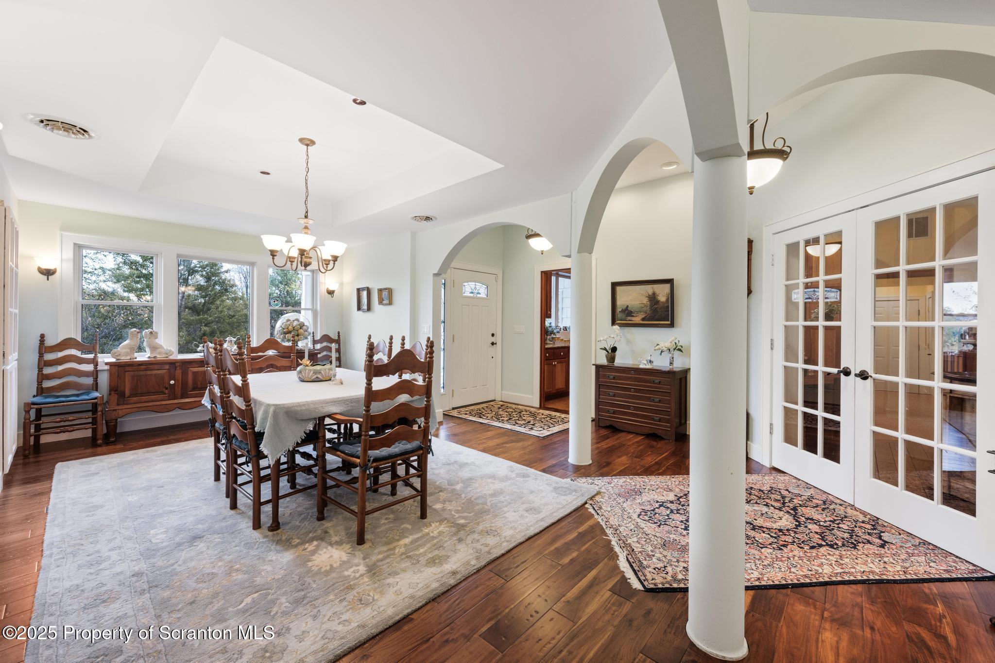 118 Autumn View Lane Factoryville, PA 18419 - Photo 13 of 28 a view of a dining room with furniture window and wooden floor