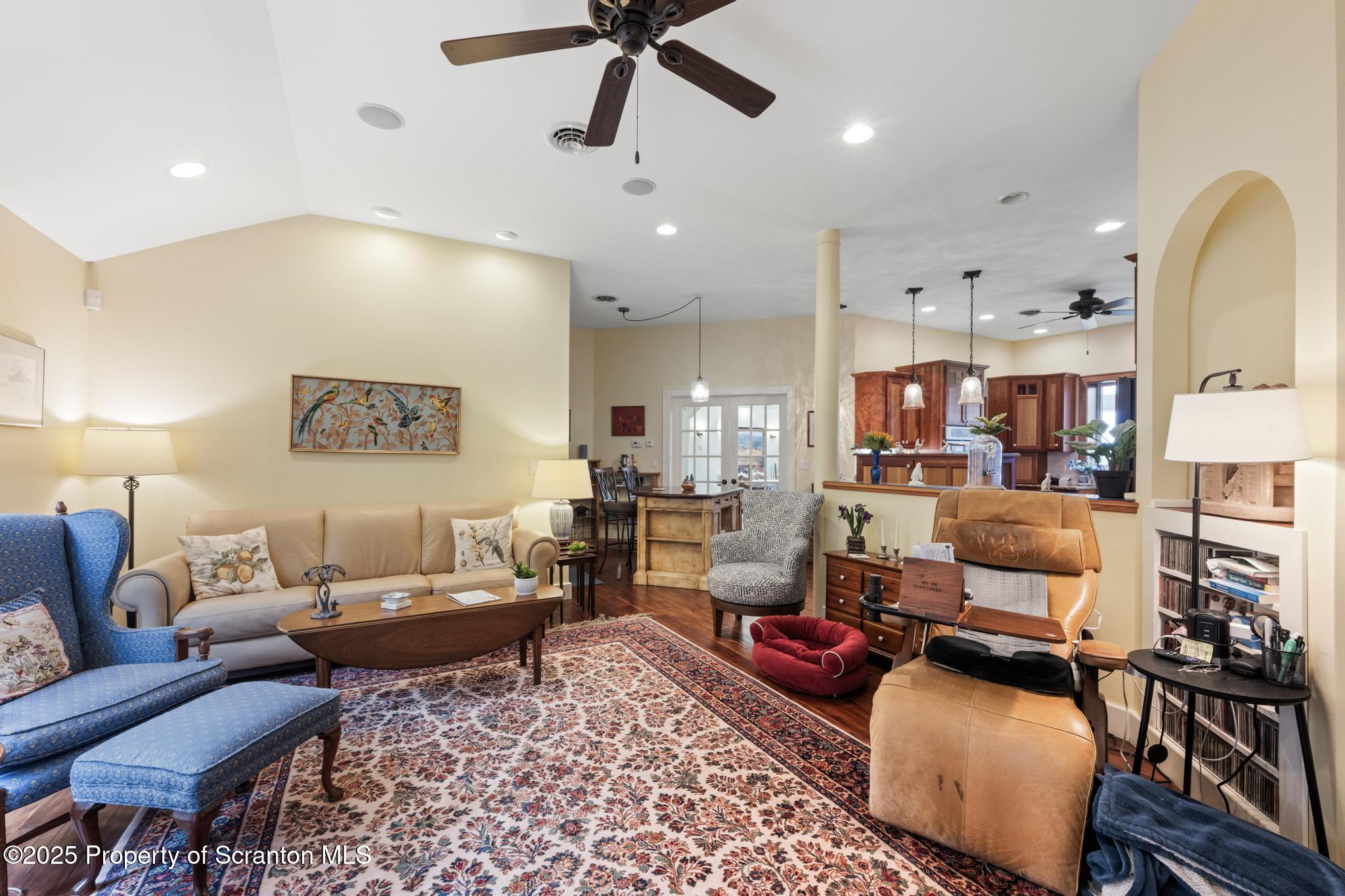 118 Autumn View Lane Factoryville, PA 18419 - Photo 17 of 28 a living room with lots of furniture and a ceiling fan