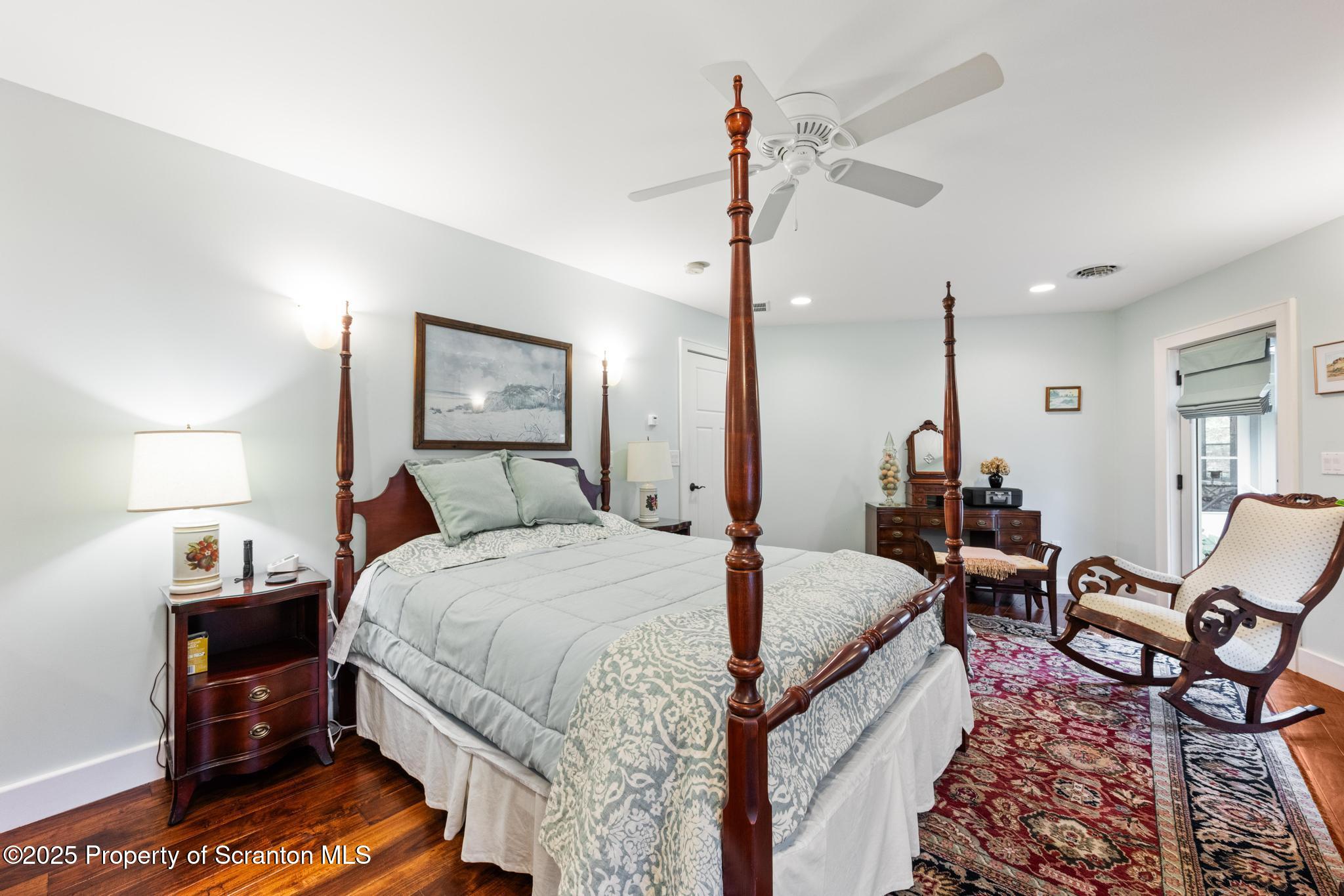 118 Autumn View Lane Factoryville, PA 18419 - Photo 26 of 28 a bed room with a bed and chair