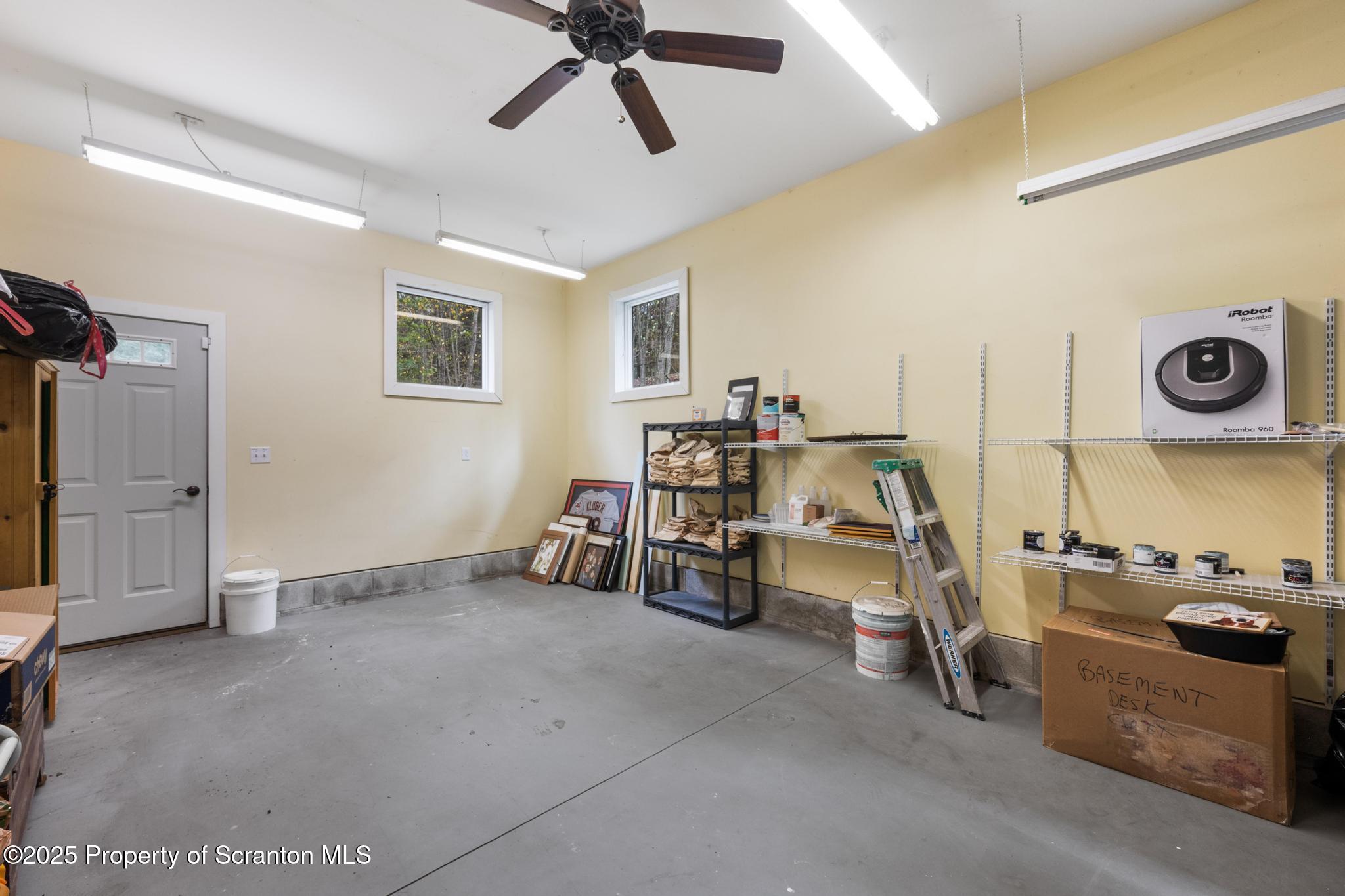 118 Autumn View Lane Factoryville, PA 18419 - Photo 28 of 28 a view of a livingroom with furniture and a ceiling fan
