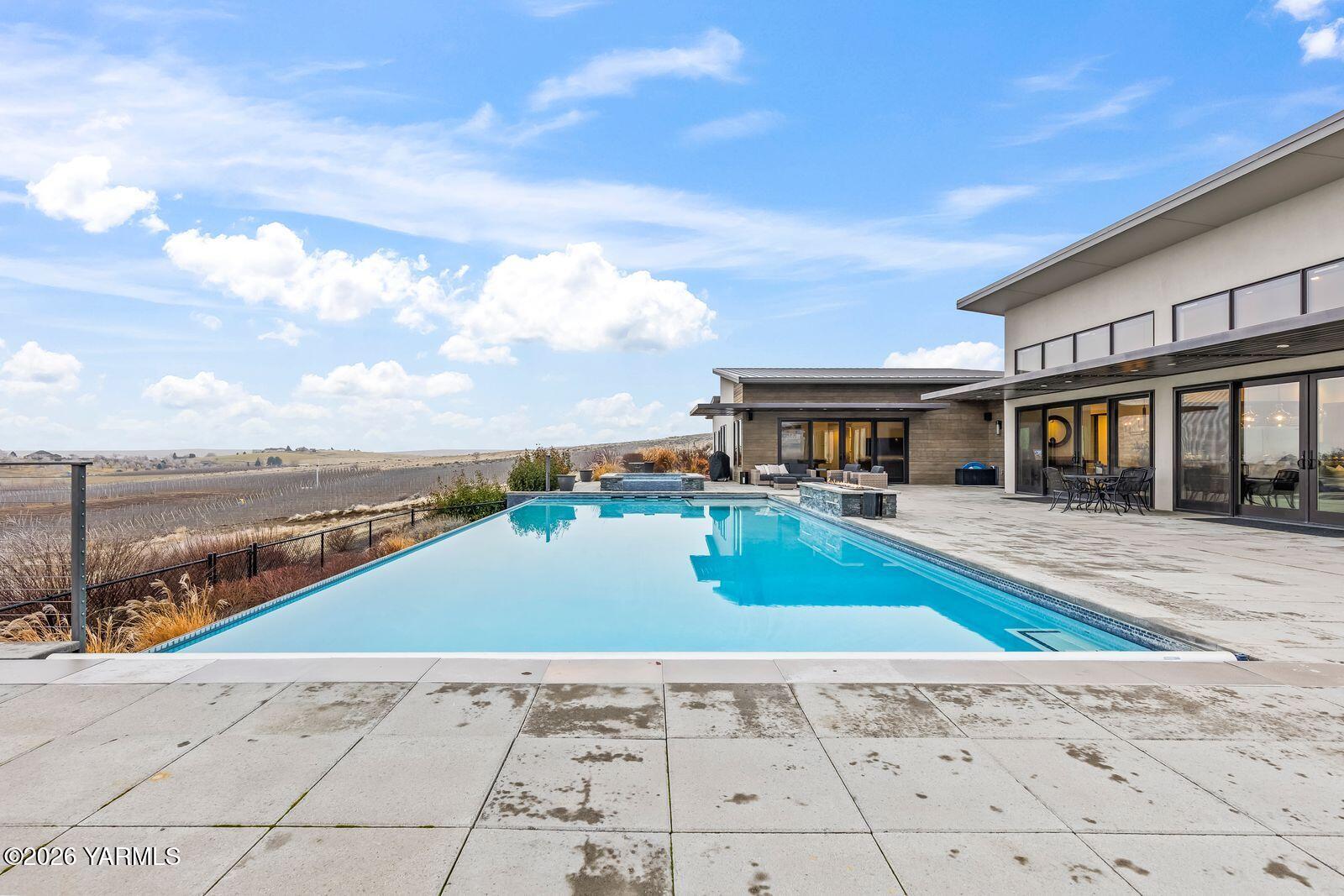 13990 Marble Road Yakima, WA 98908 - Photo 54 of 60 a view of a house with pool