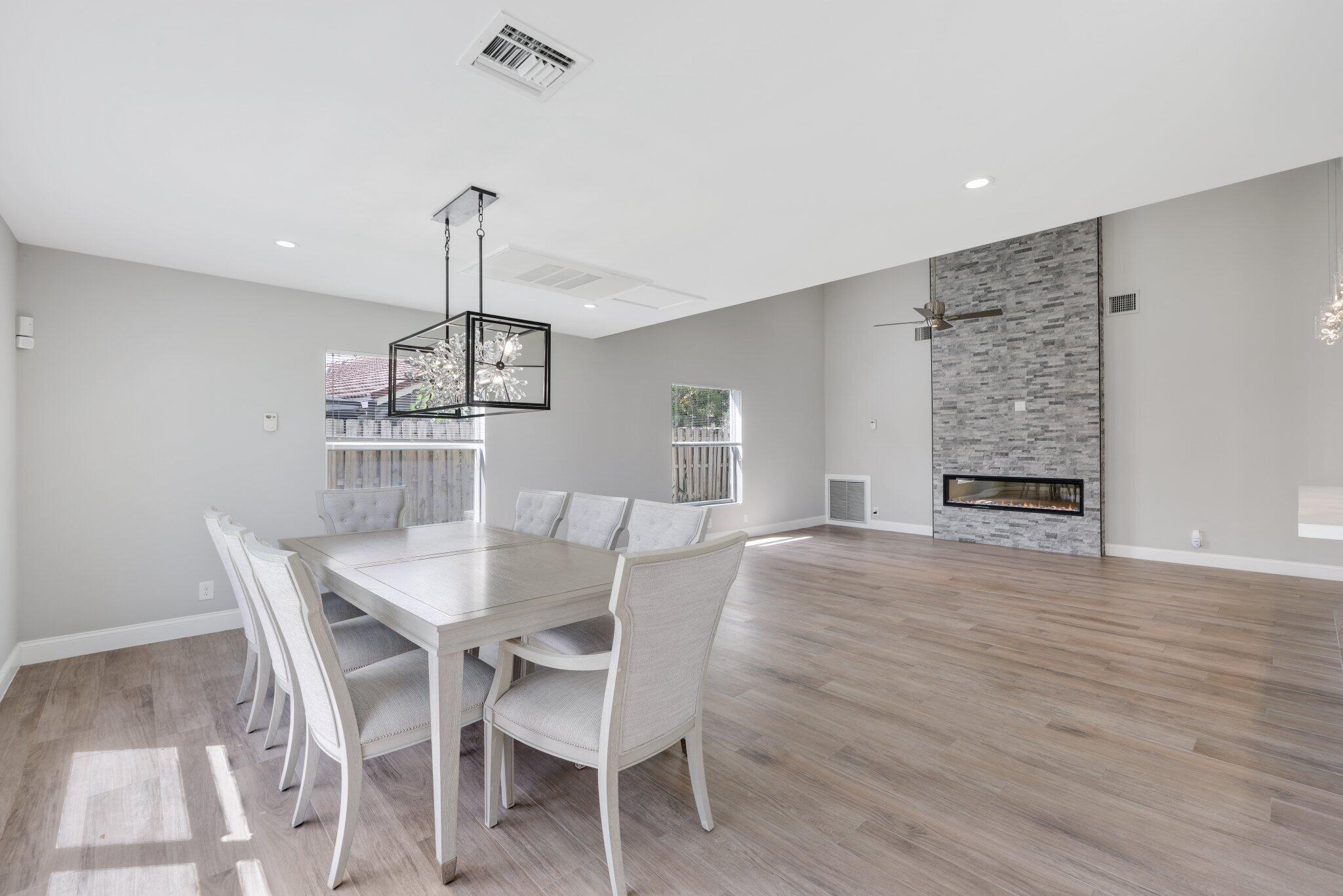 6940 Northwest 4th Avenue Boca Raton, FL 33487 - Photo 12 of 37 Dining Room + Living Room