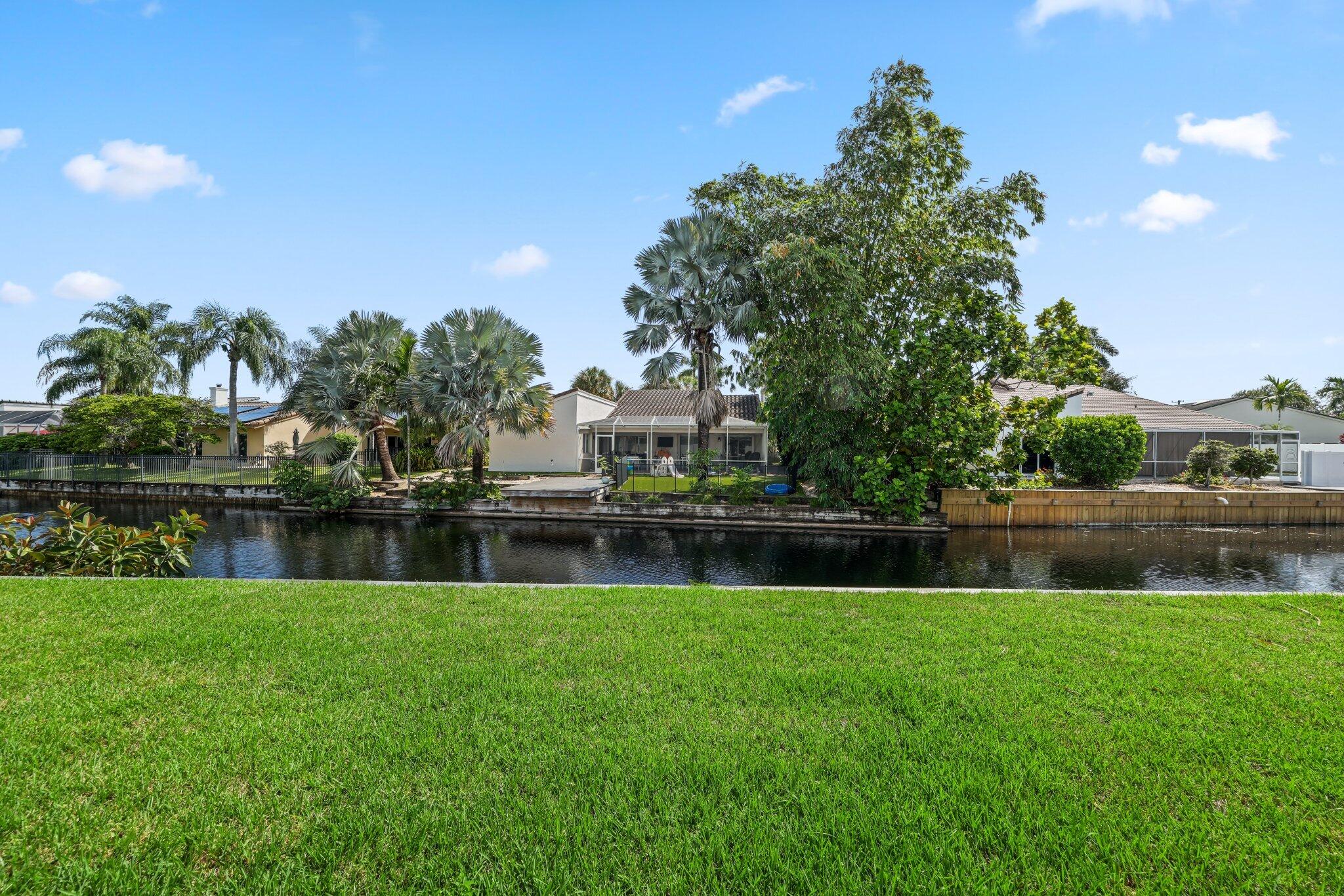 6940 Northwest 4th Avenue Boca Raton, FL 33487 - Photo 2 of 37 Tranquil water views