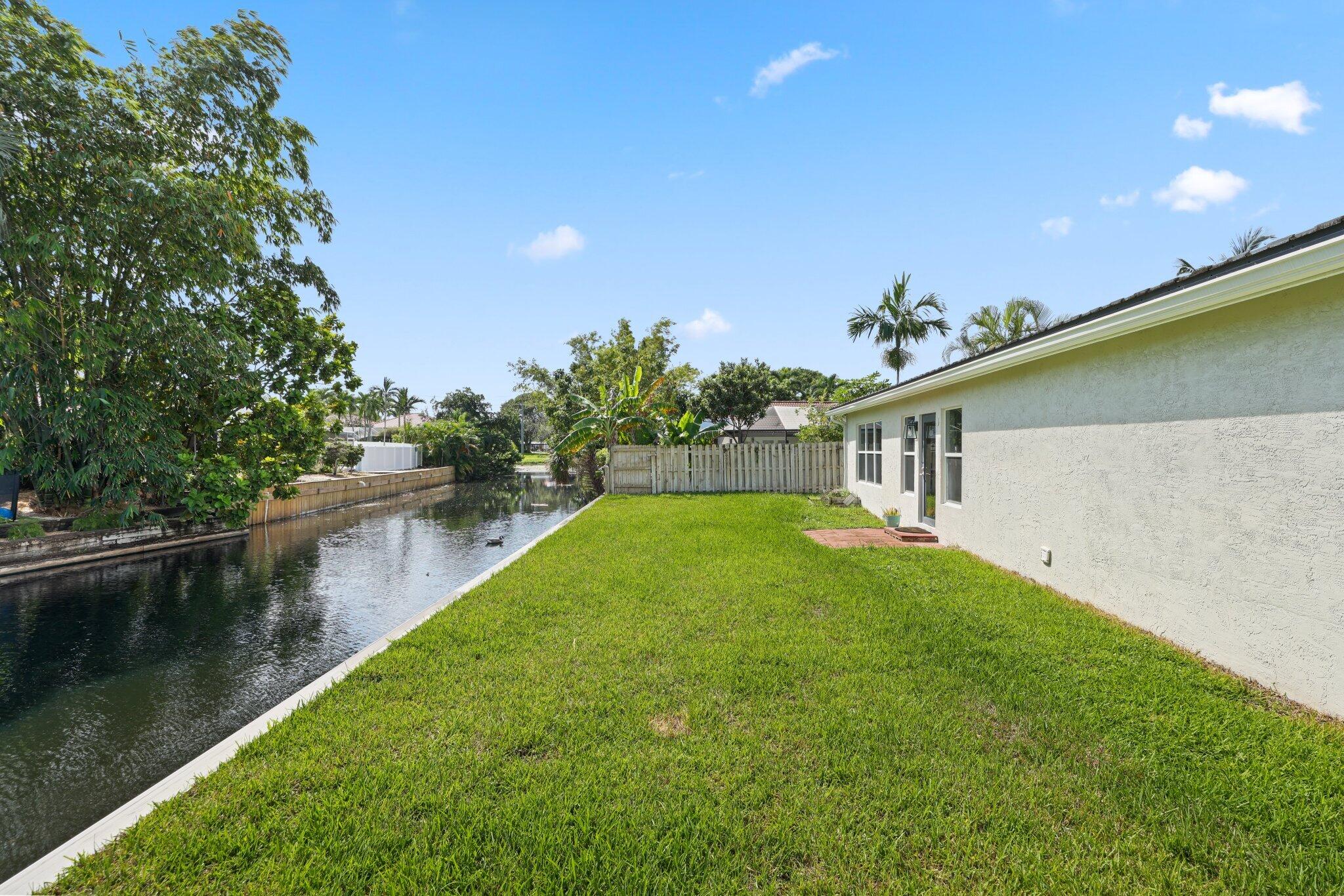 6940 Northwest 4th Avenue Boca Raton, FL 33487 - Photo 30 of 37 Fenced Backyard Space