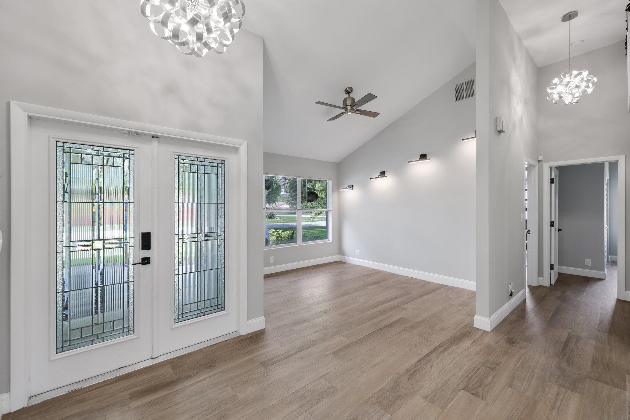 6940 Northwest 4th Avenue Boca Raton, FL 33487 - Photo 3 of 37 Foyer + Den/3rd Bedroom